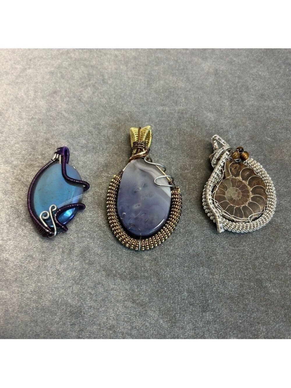 handmade wire-wrapped gemstone pendants blue agate purple agate ammonite fossil